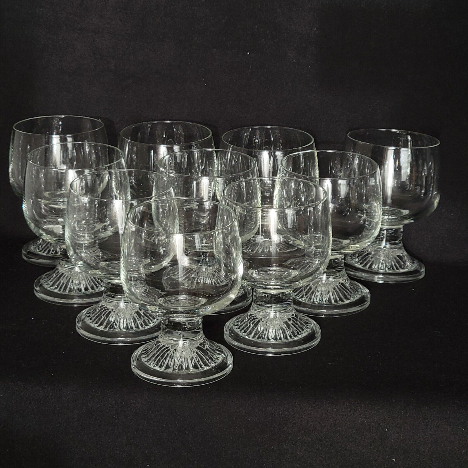 10 vintage stemmed glasses in molded glass