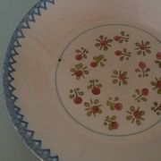 Hollow plate in earthenware, early twentieth century