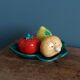 Salt and pepper shaker vegetables on a slipware leaf signed FPP Vallauris.