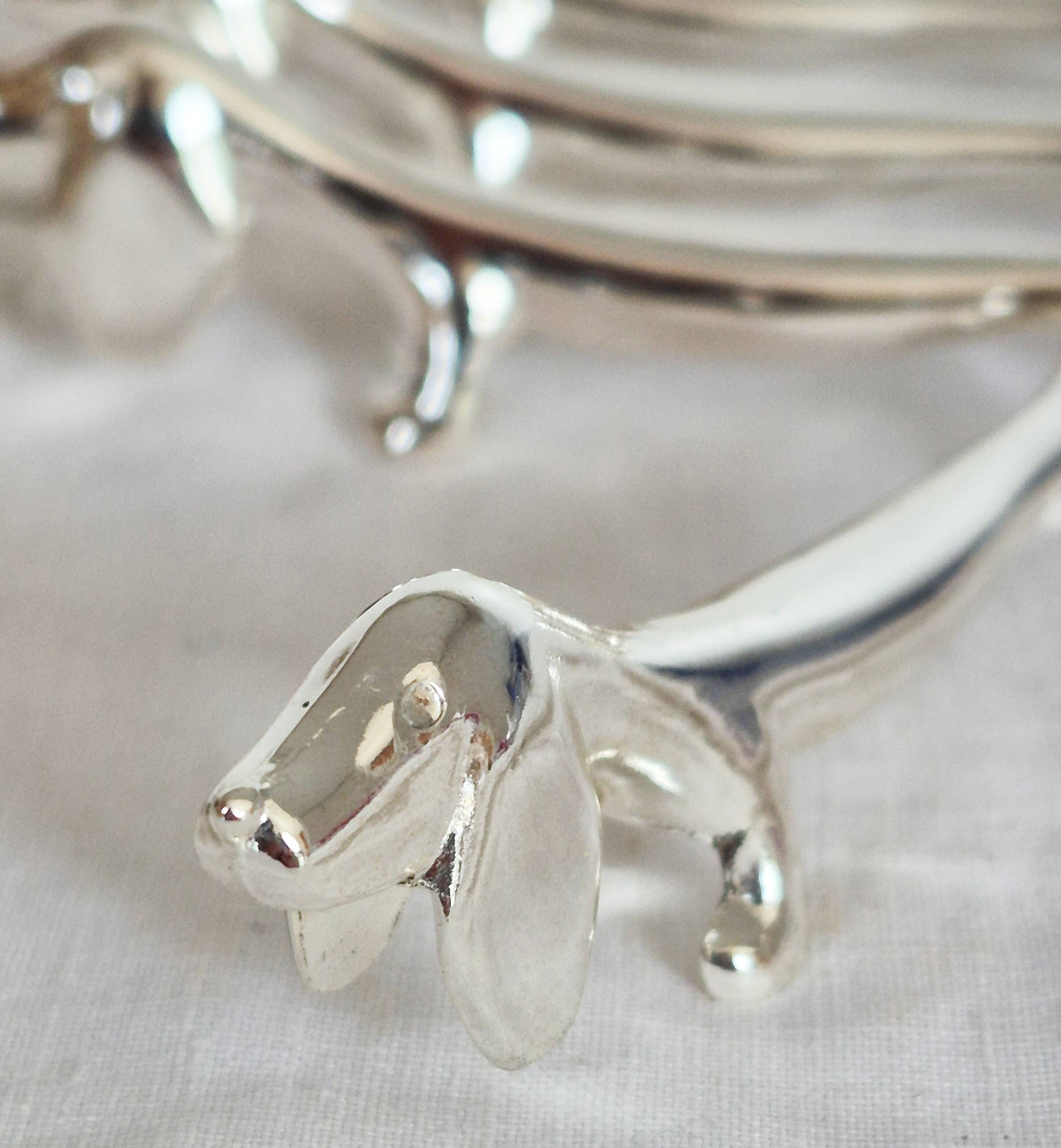 Silver-plated metal dachshund knife rest, 1950s