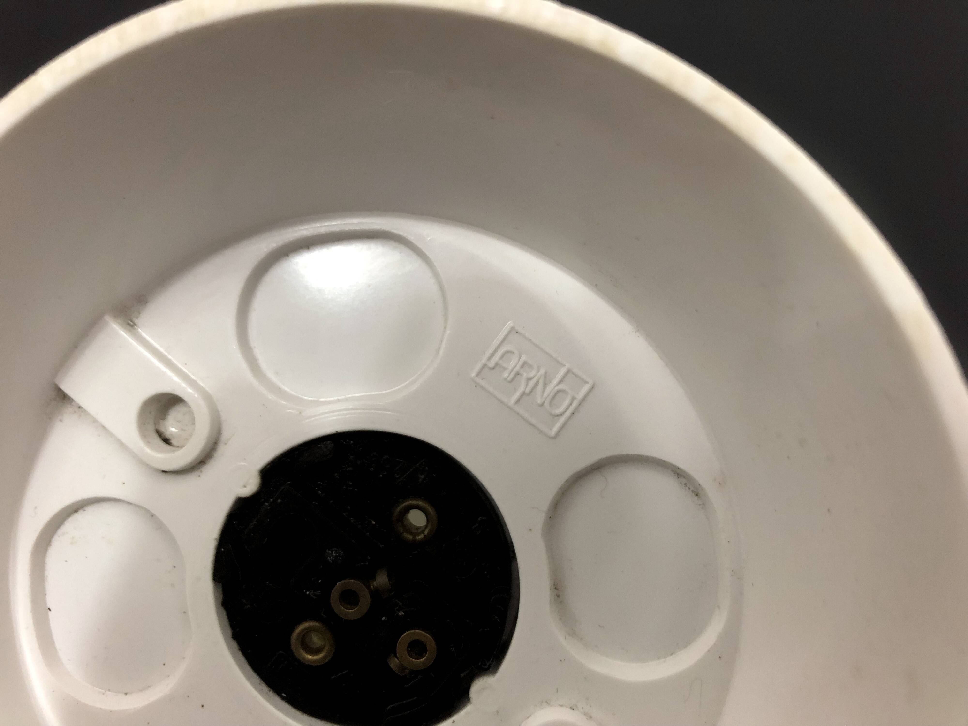 Pair of white oblique wall lights by Arno. 60s