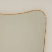 Patinated brass-framed mirror. 1980s/90s.