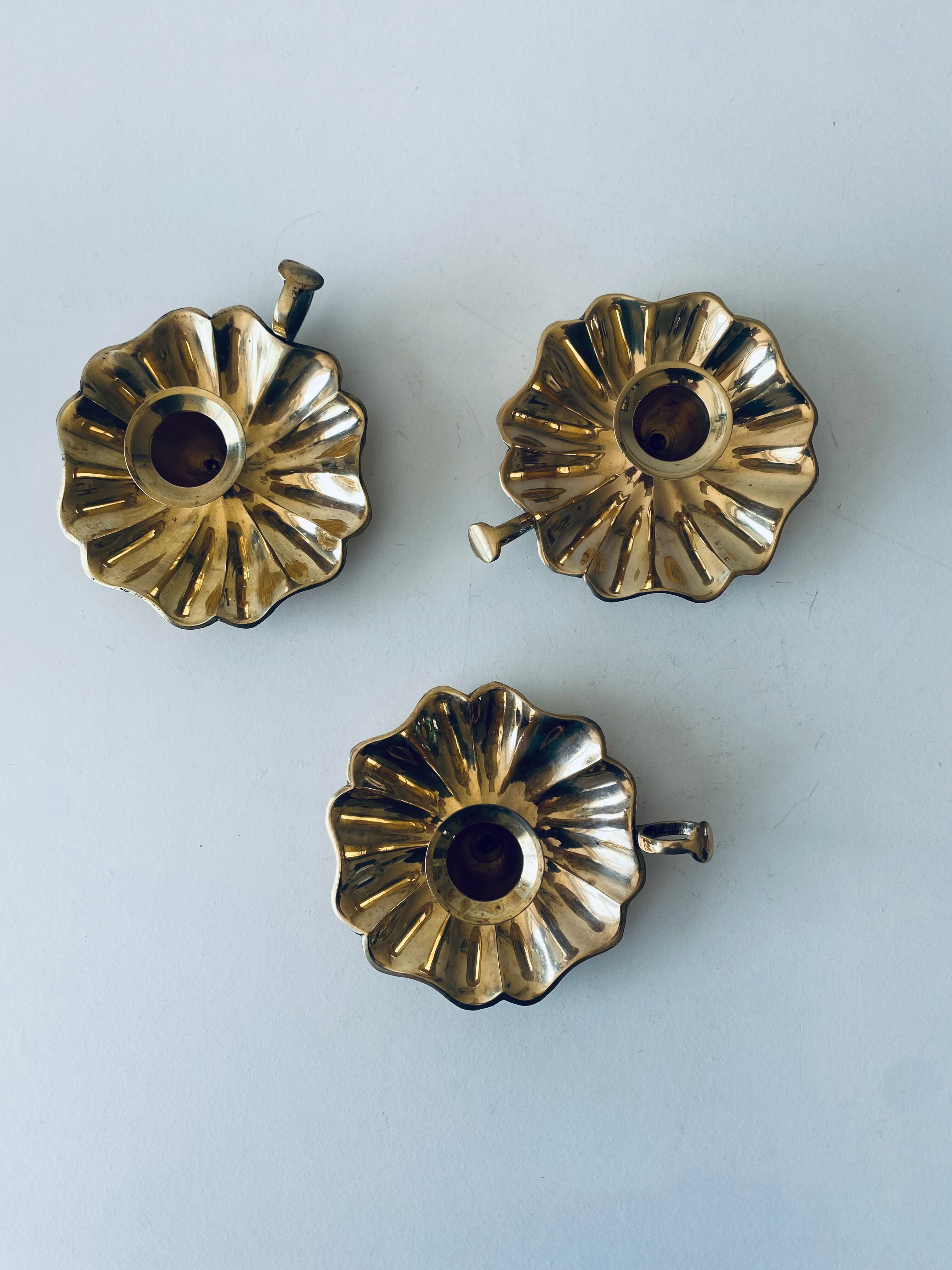 Indian candle holder in golden brass