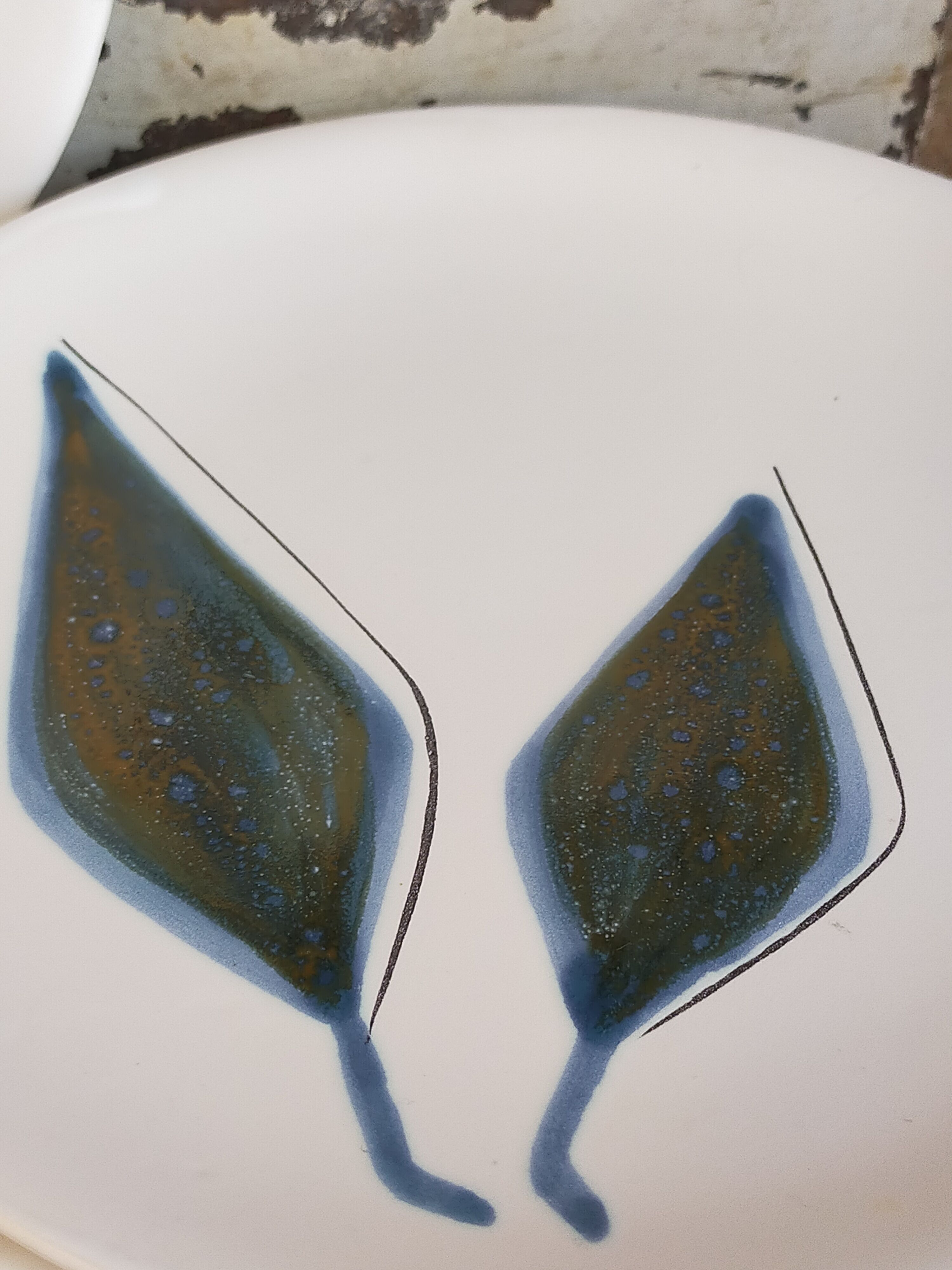 Six ceramic plates with matt enamel 50s