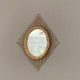 Sun mirror in woven rattan. 1960. Diamond.