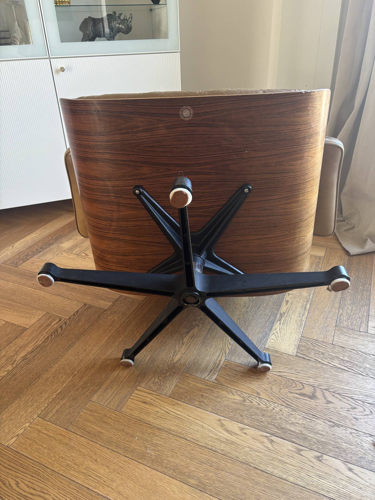 Armchairs and footrests by Charles & Ray Eames