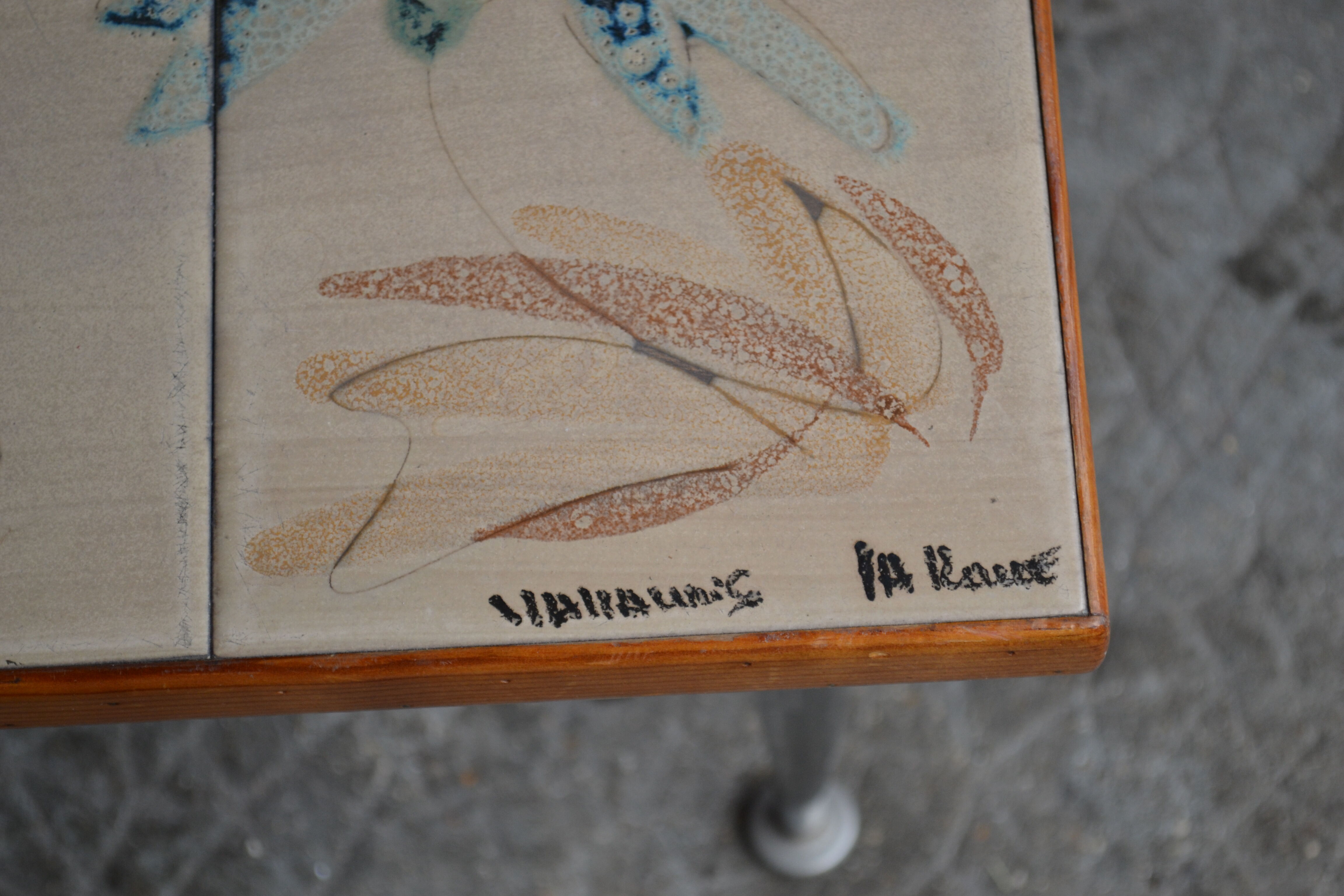 pull-out tables Vallauris, signed 'the wheel' ceramic, chrome foot