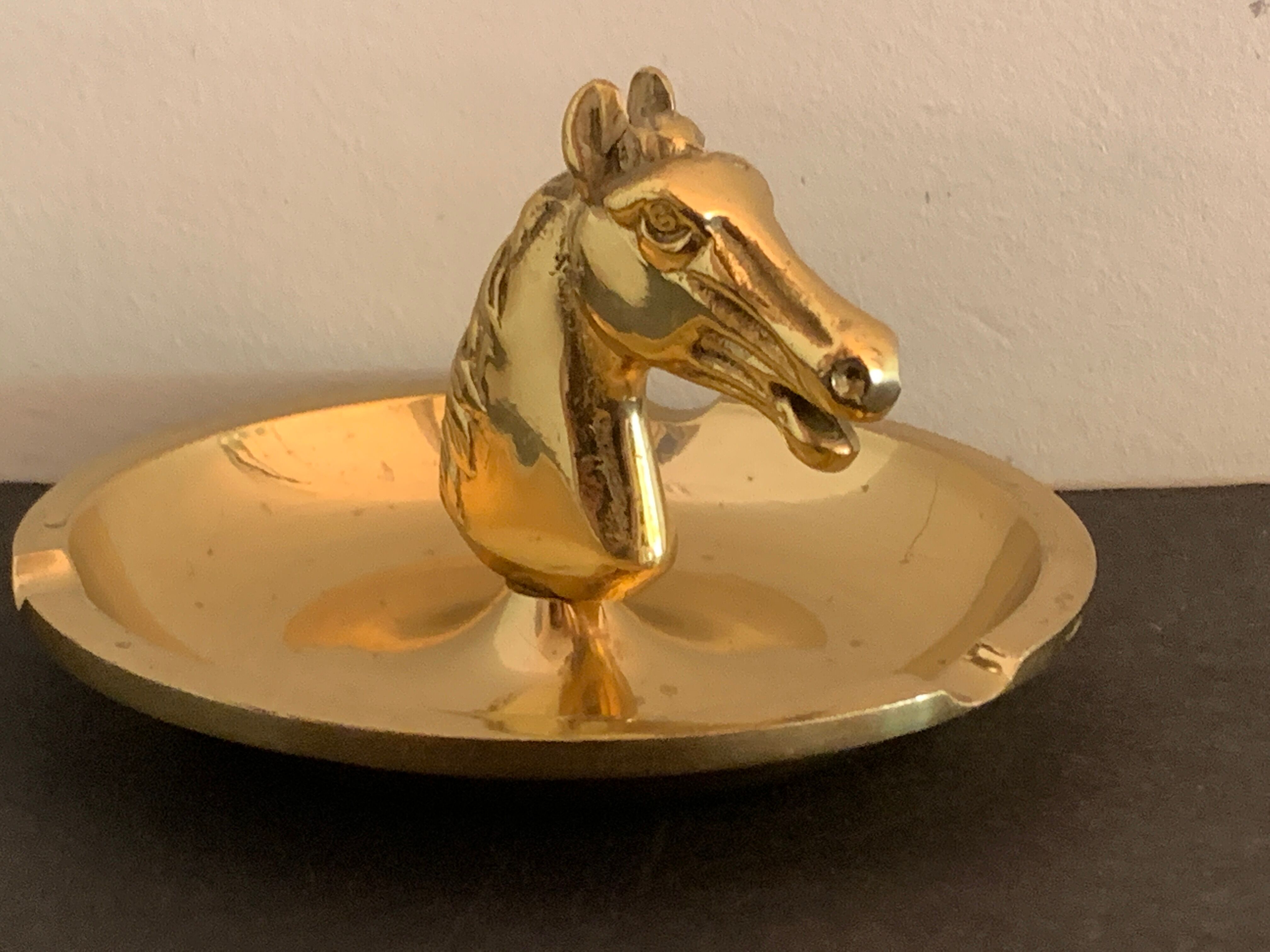 Horse-headed brass ashtray
