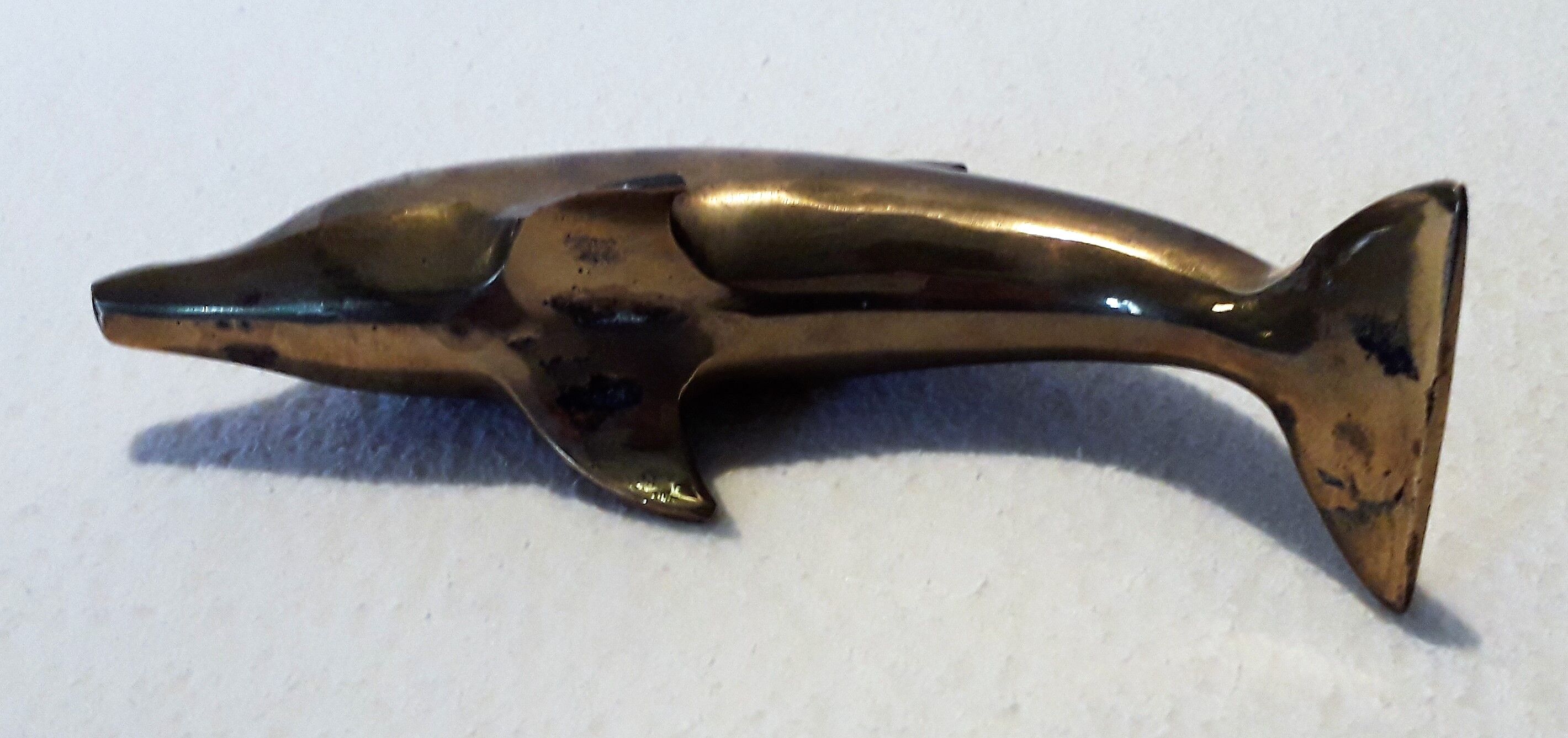 Brass dolphin