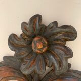 Appliques murales en bois sculpté