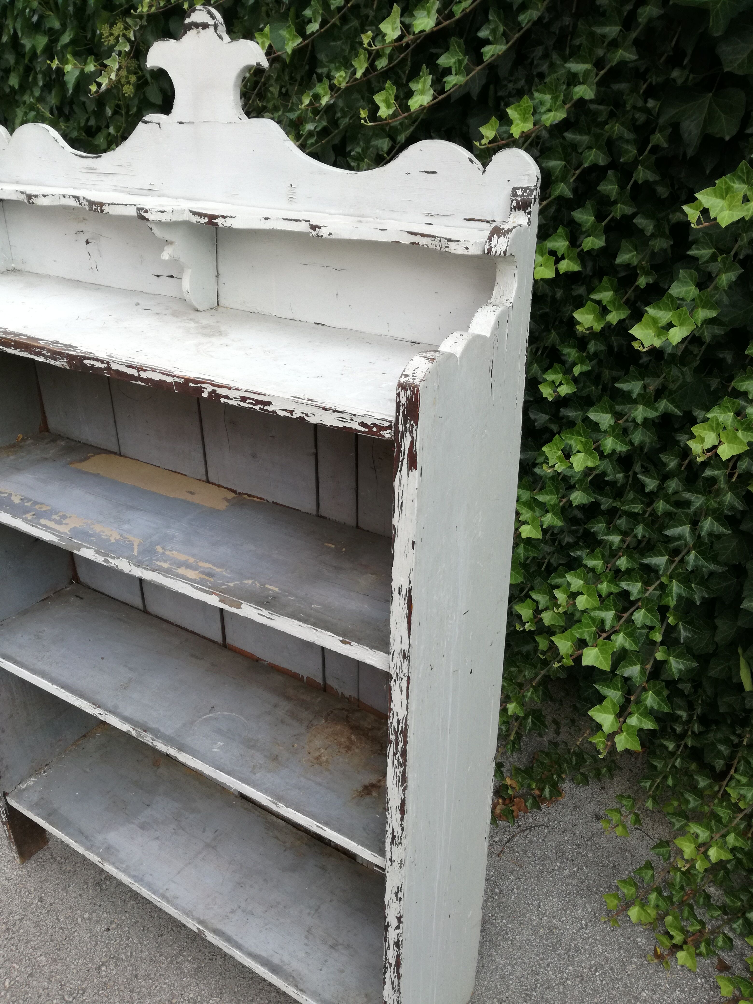 Old white shelf in weathered pine