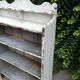 Old white shelf in weathered pine