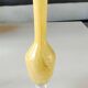 Murano-style single-flower vase. Speckled in yellow tones. Height 28 cm