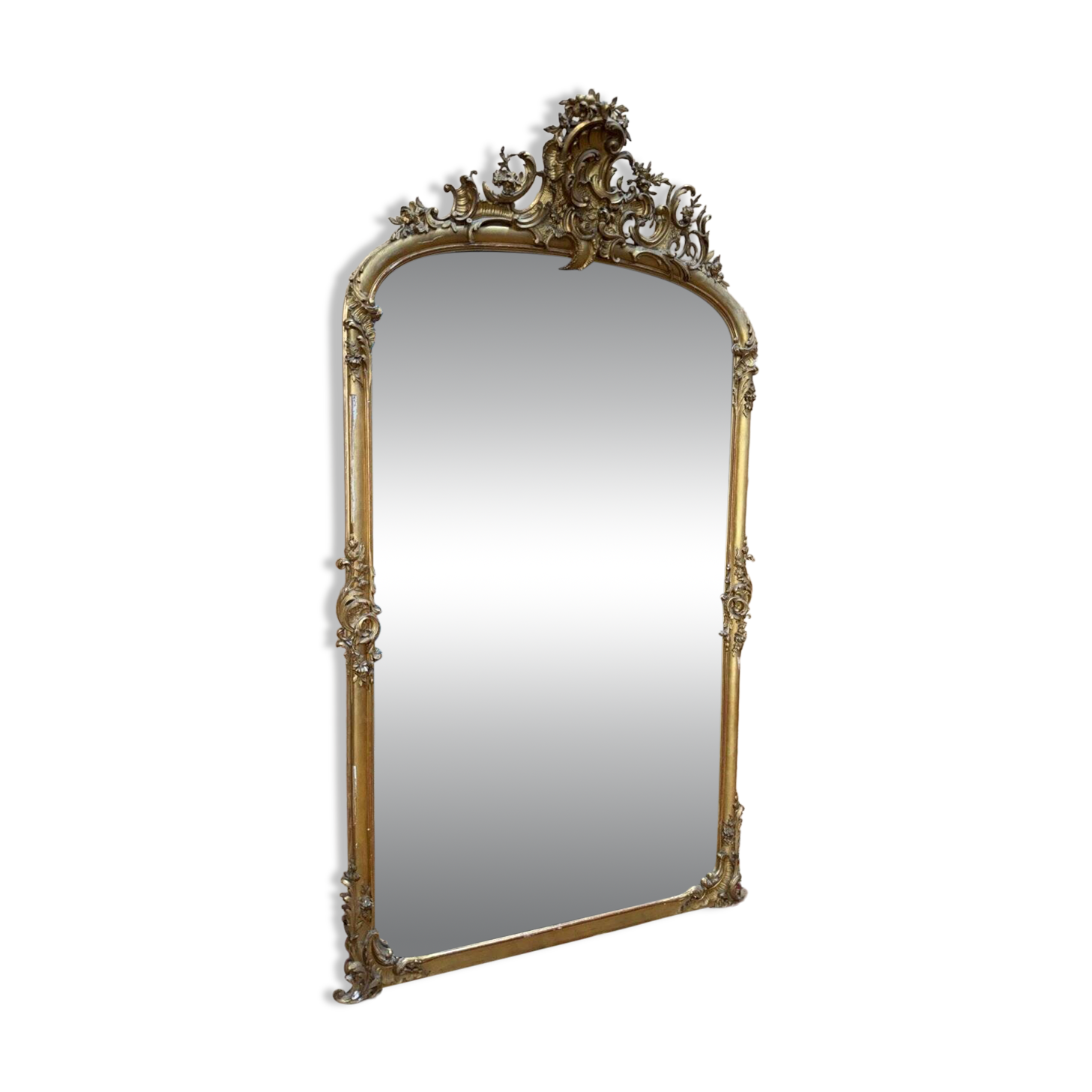Napoleon III mirror in wood and gilded stucco with gold leaf.