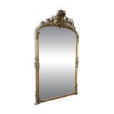 Napoleon III mirror in wood and gilded stucco with gold leaf.