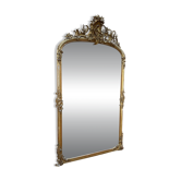 Napoleon III mirror in wood and gilded stucco with gold leaf.