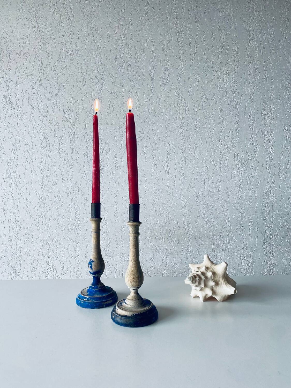 Pair of old patinated candlesticks