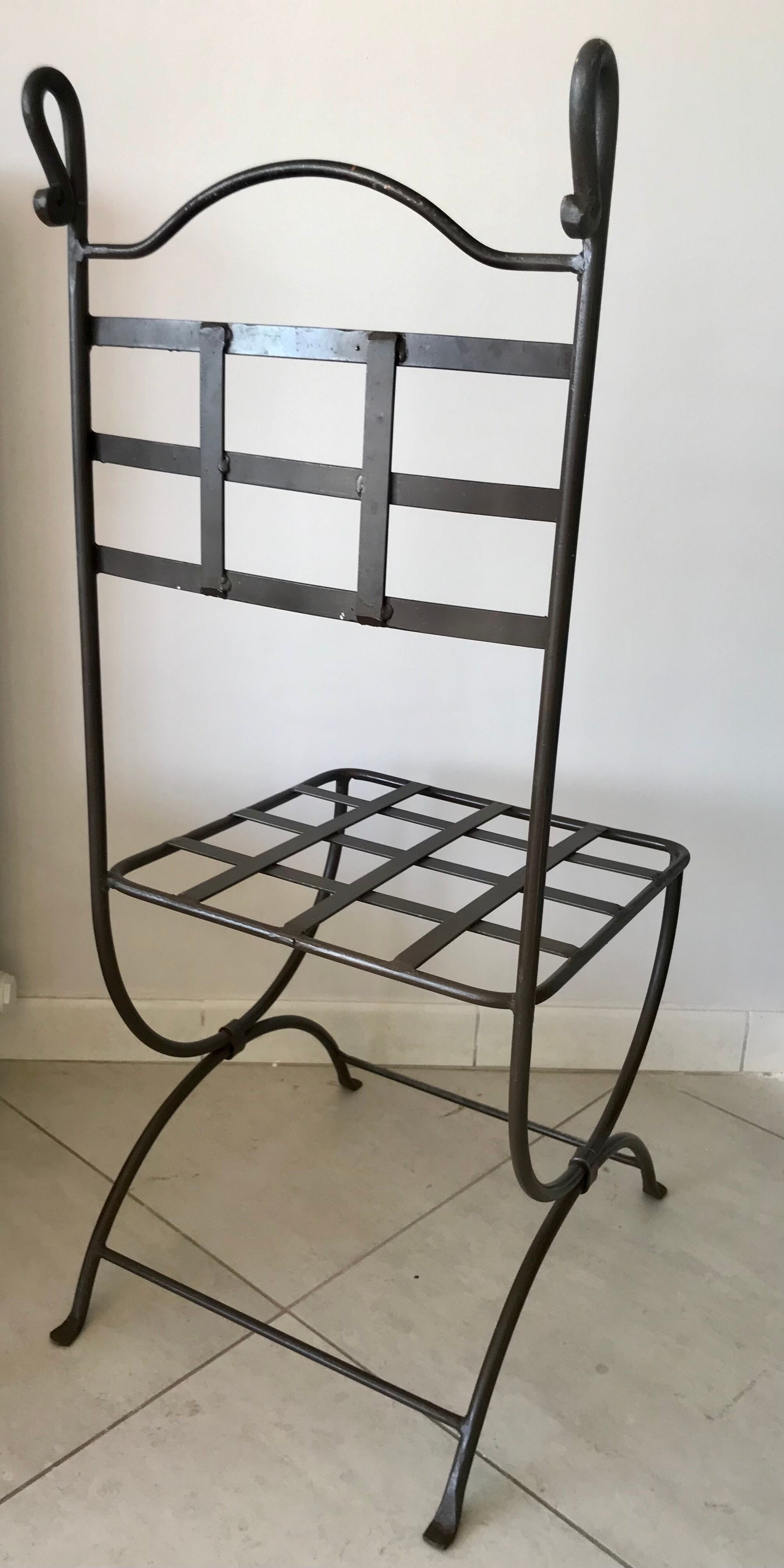 Six wrought iron chairs