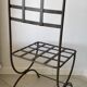Six wrought iron chairs
