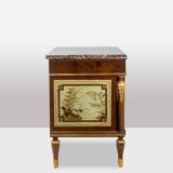 Empire style chest of drawers in lacquer, bronze and marble. Nineteenth century.