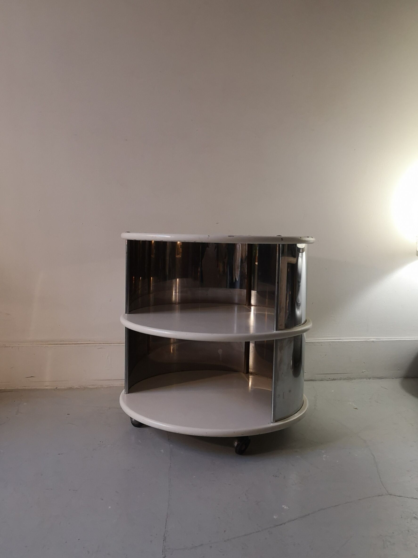 Pair of mirrored space age cylindrical bedside tables, 1960