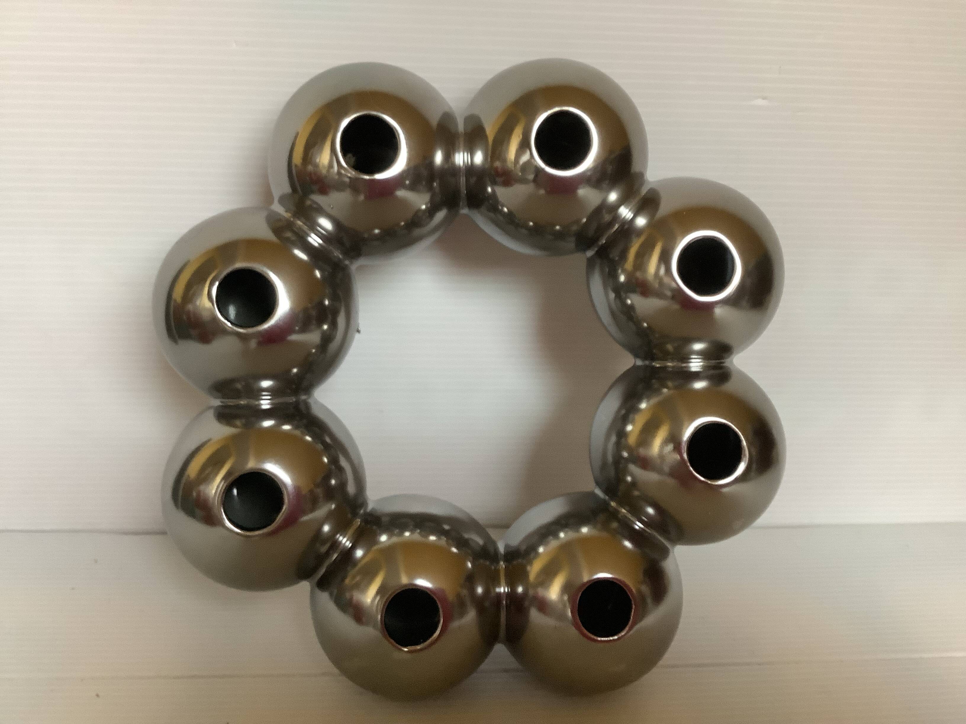 Silver flower vase in a crown shape.