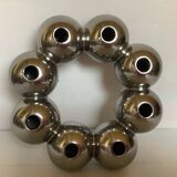 Silver flower vase in a crown shape.