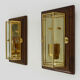Paire d'appliques murales Sothis, structure bois, laiton et 3 faces en verre biseauté