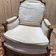 Paire de fauteuil / bergères de style Louis XVI beige
