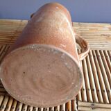 Pitcher in water in sandstone