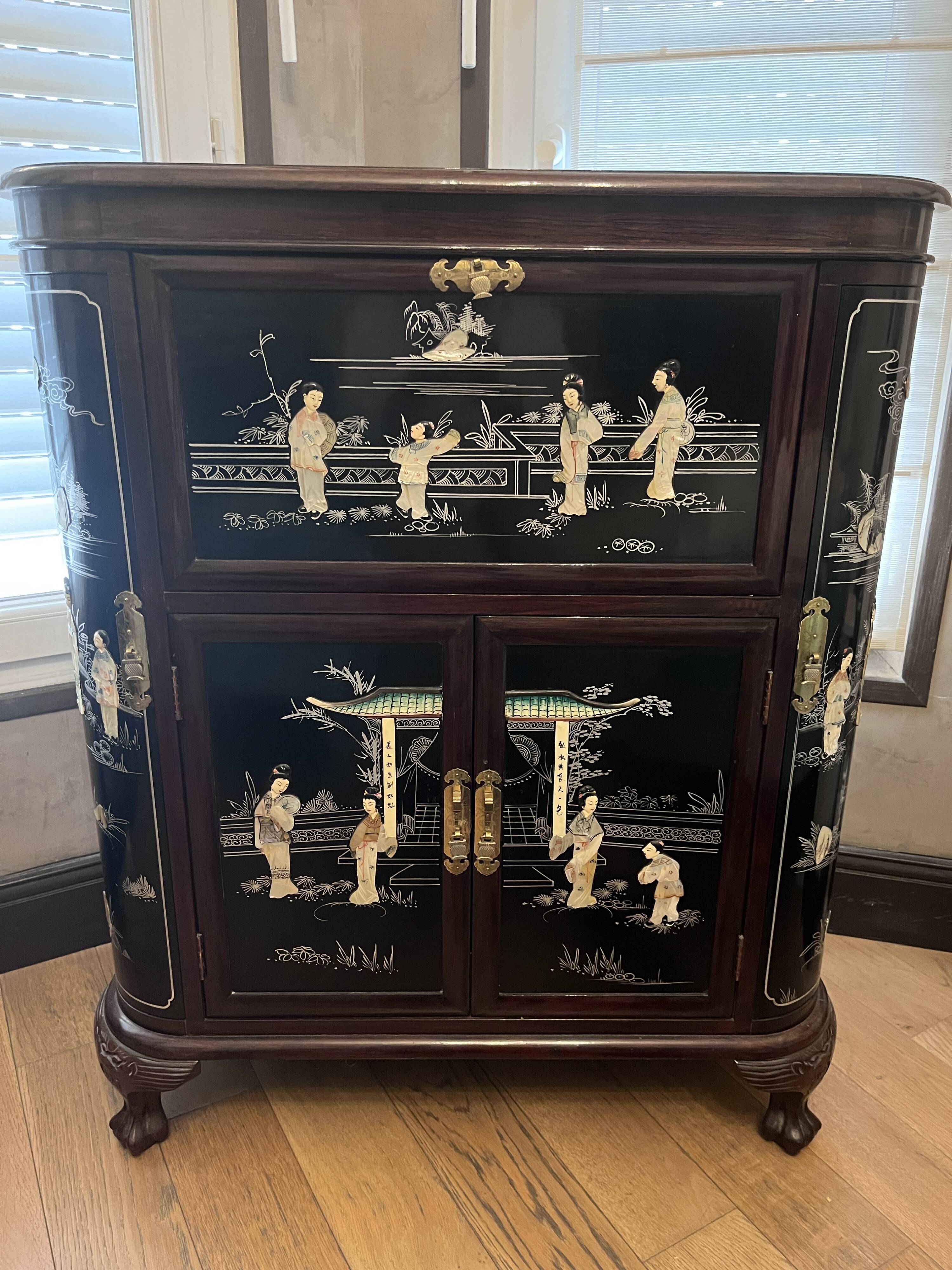 "Chinese black lacquer cabinet, mother-of-pearl inlays, court scenes"