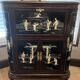 "Chinese black lacquer cabinet, mother-of-pearl inlays, court scenes"