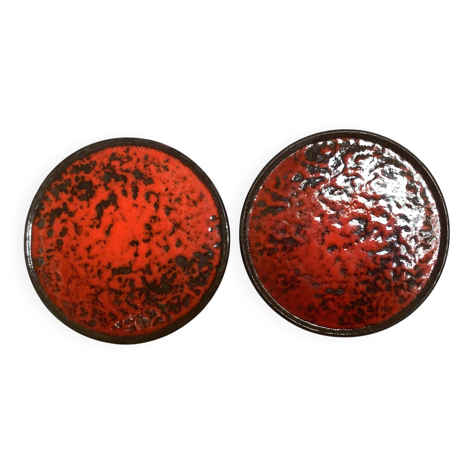 Pair of red speckled ceramic trivets