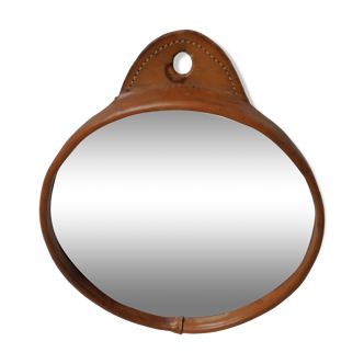 Round mirror in leather