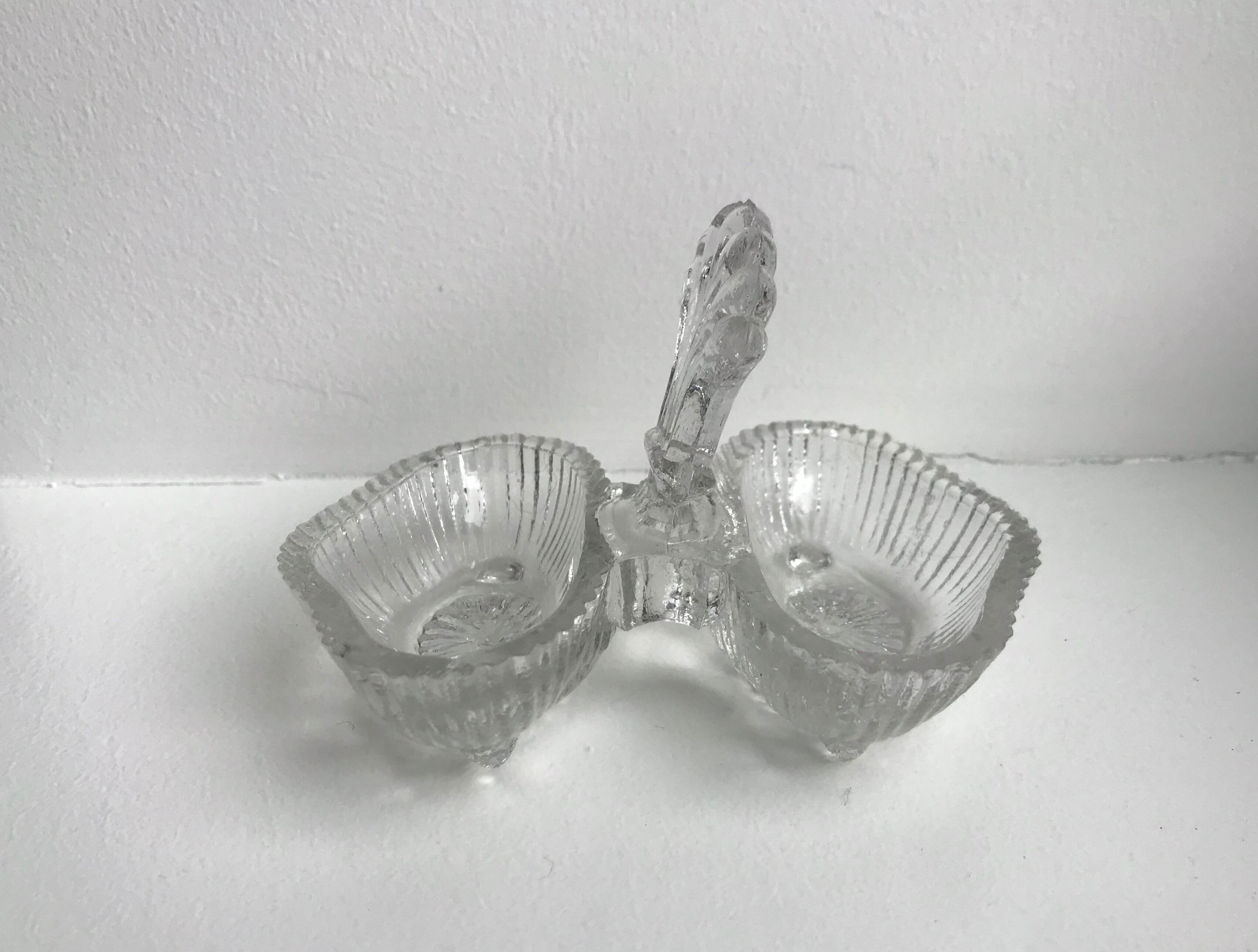 Trio of mismatched salt shakers in molded pressed glass 50s