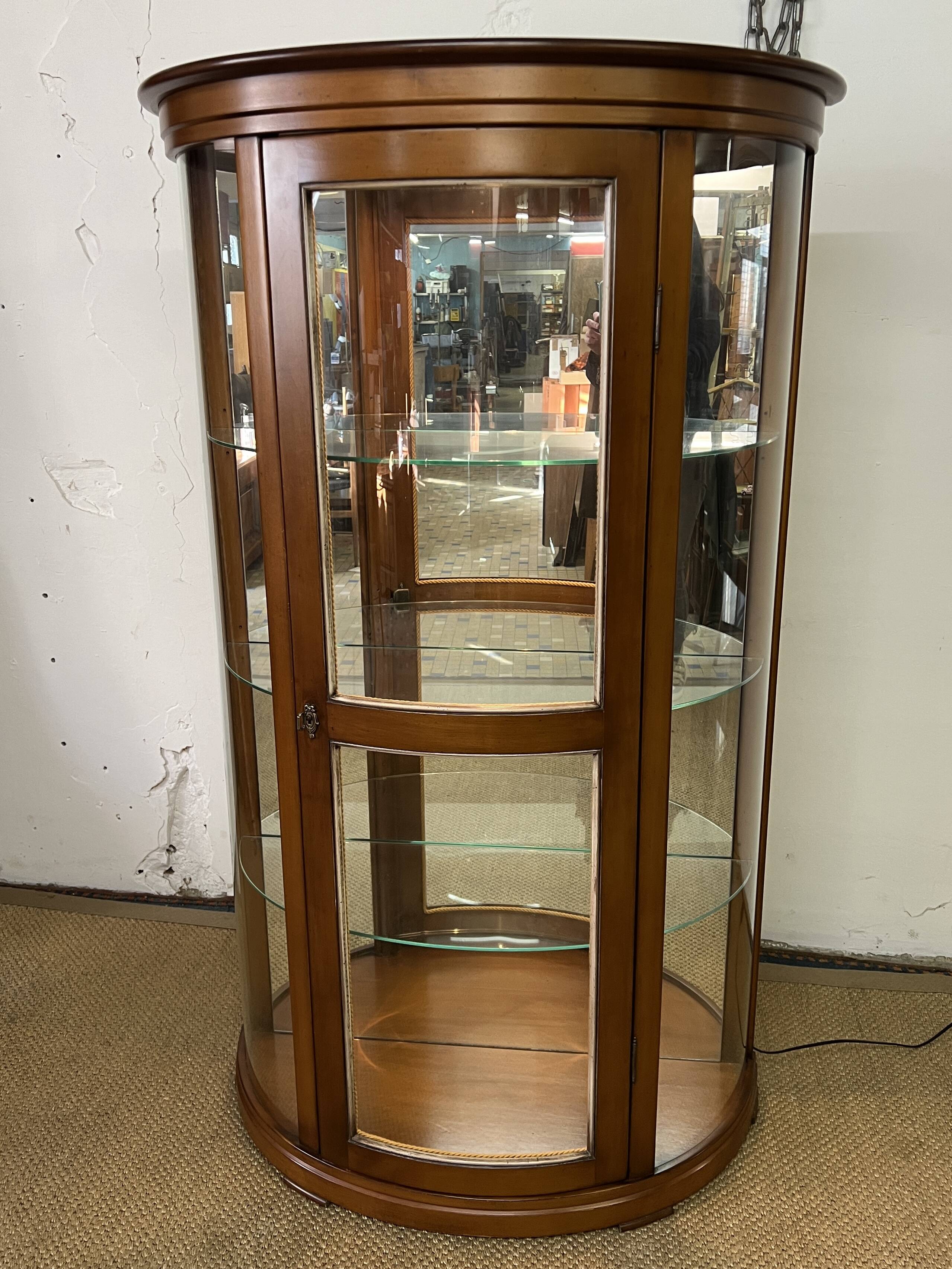 Wooden display case and half-moon mirror