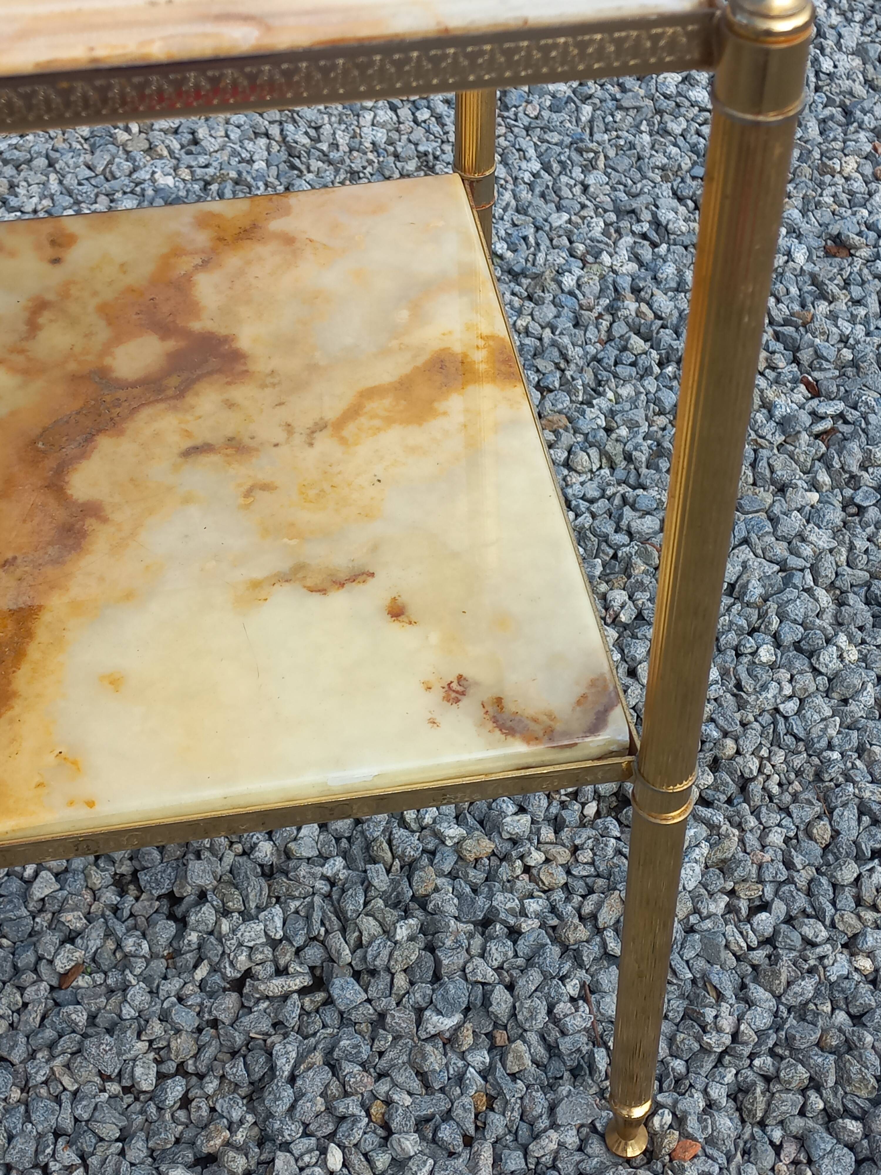 Pair of neoclassical side tables in bronze, brass, marble, and o.