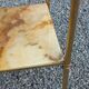 Pair of neoclassical side tables in bronze, brass, marble, and o.