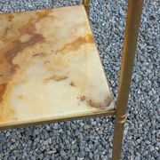 Pair of neoclassical side tables in bronze, brass, marble, and o.