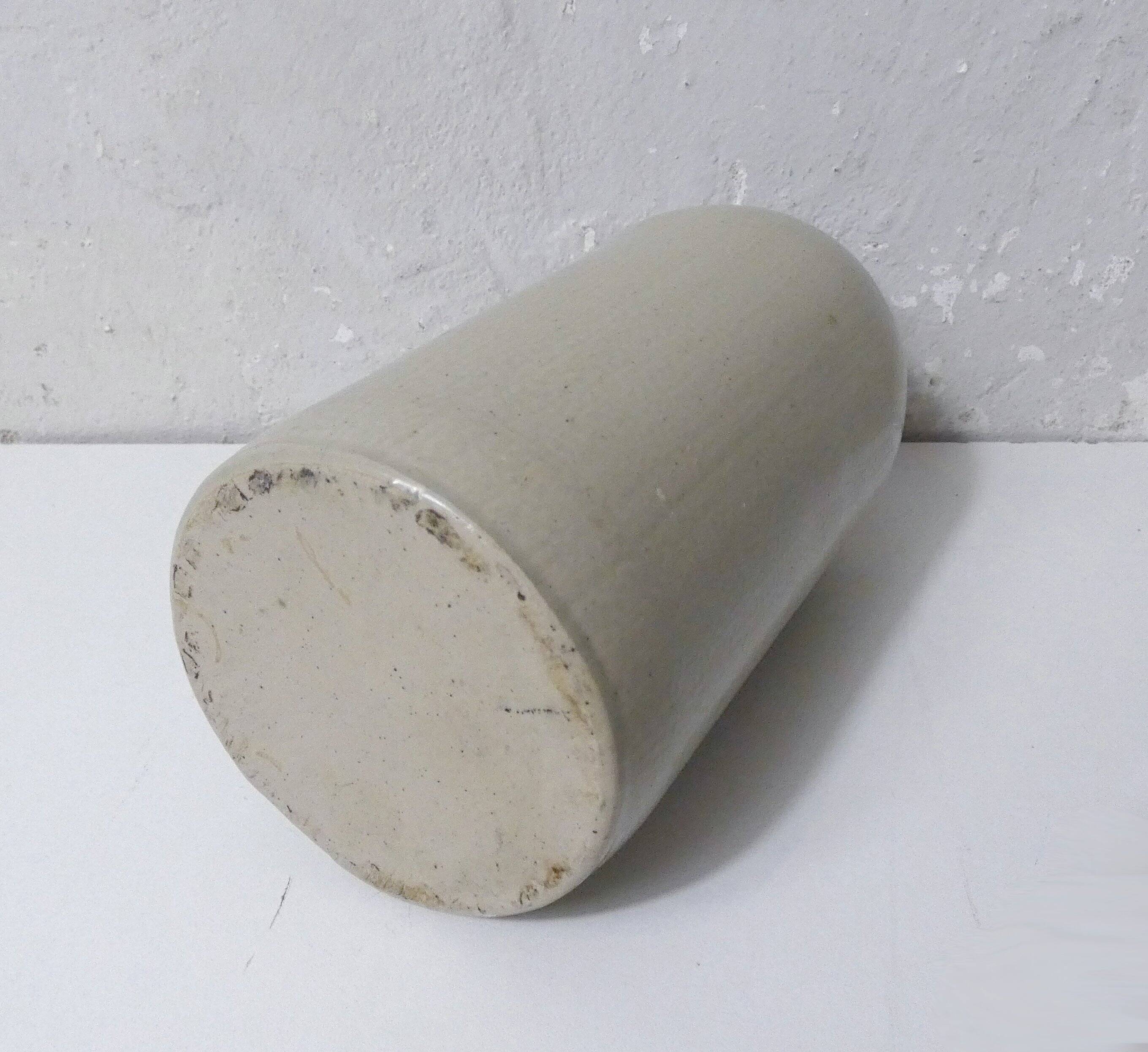 old beige stoneware bottle