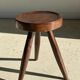 Brown solid wood stool seated circular dug
