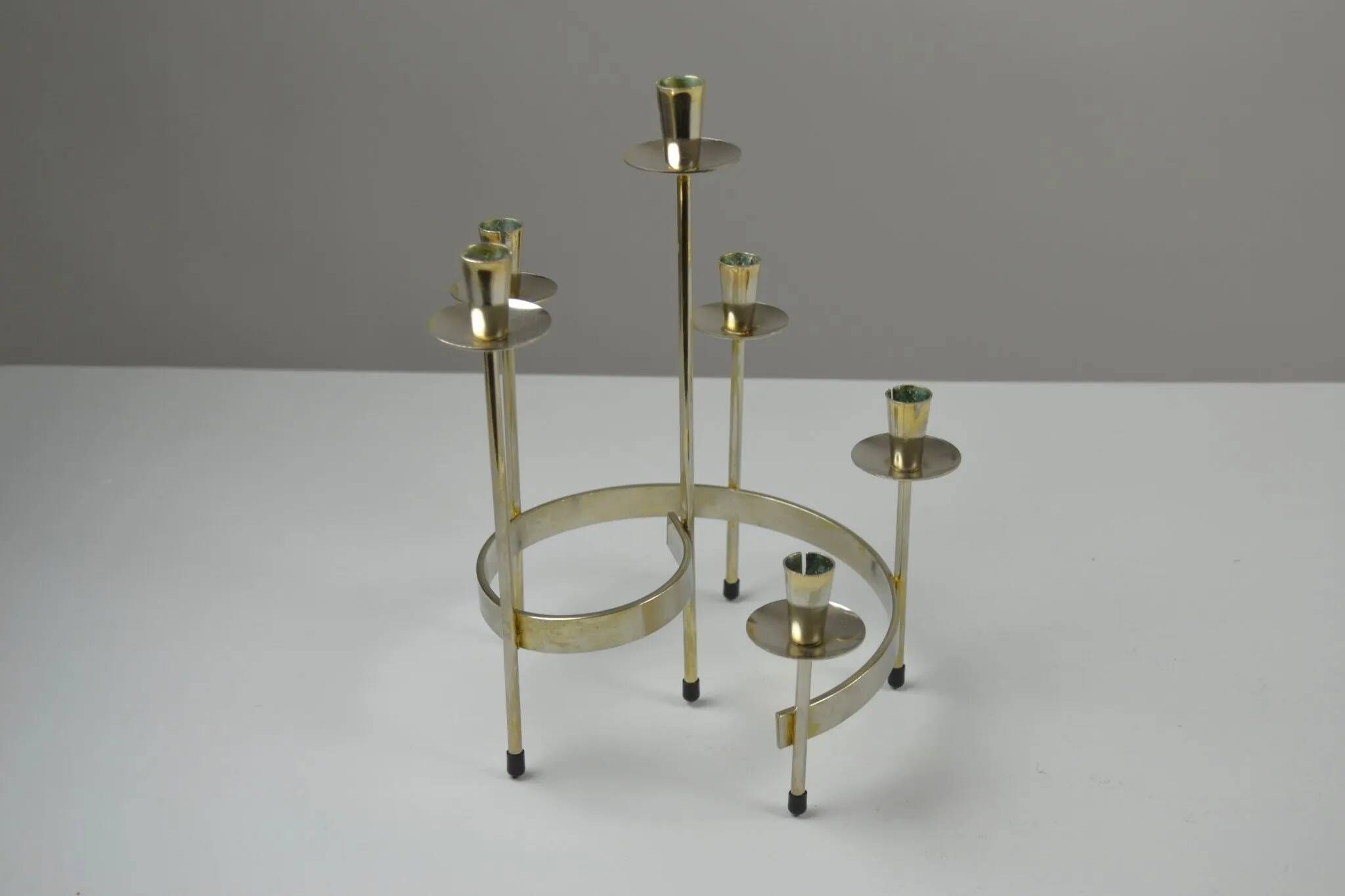 Pair of white metal candle holders "Spiral" by Gunnar Ander for Ystad-Metall, Sweden, 1960s.