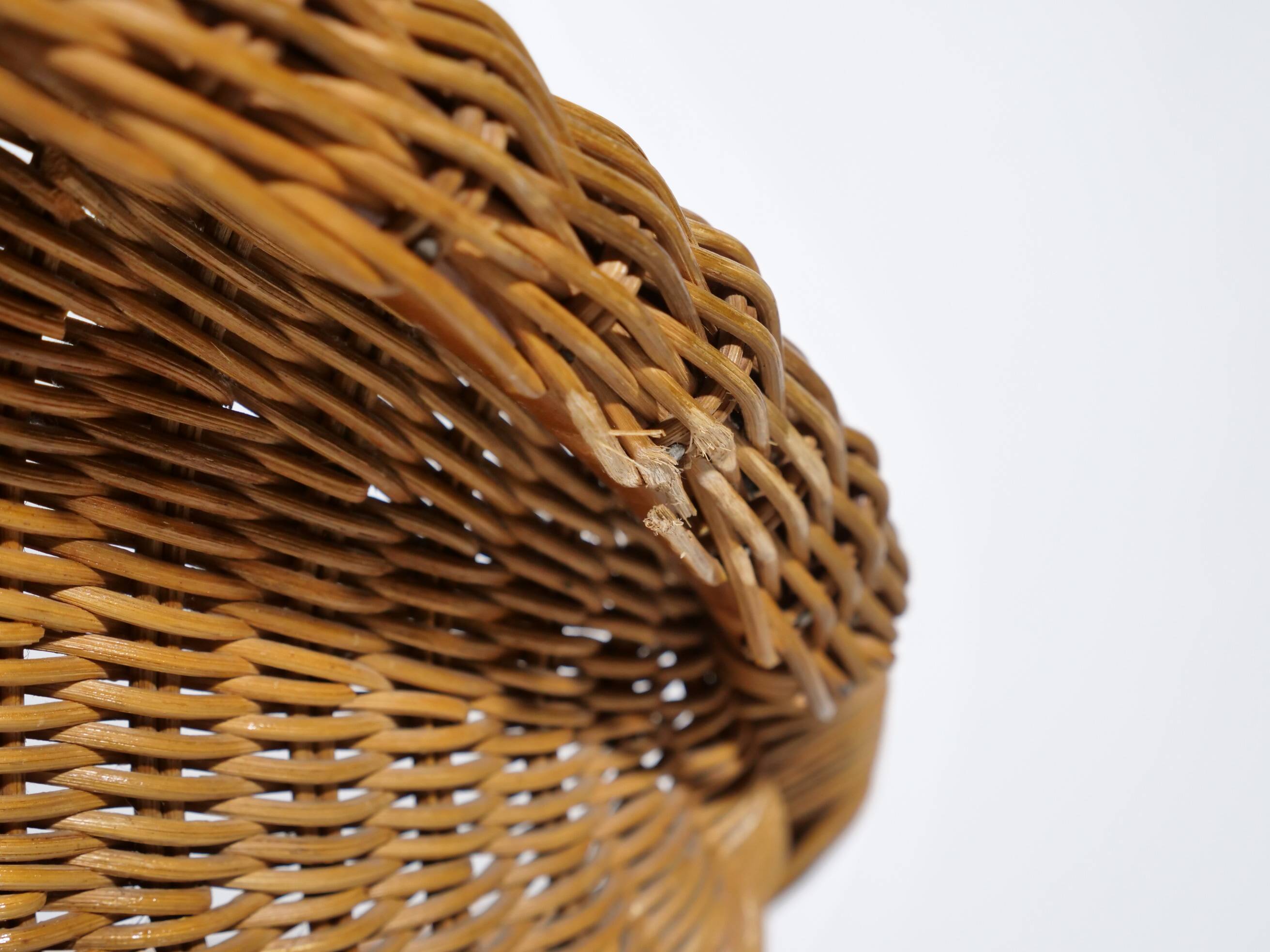 Woven rattan armchair from the 1960s