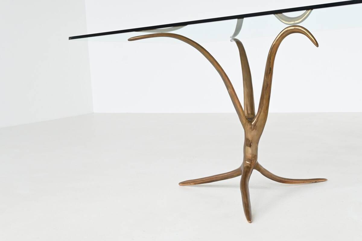 Unique sculptural dining table in bronze and glass, Belgium 1970.