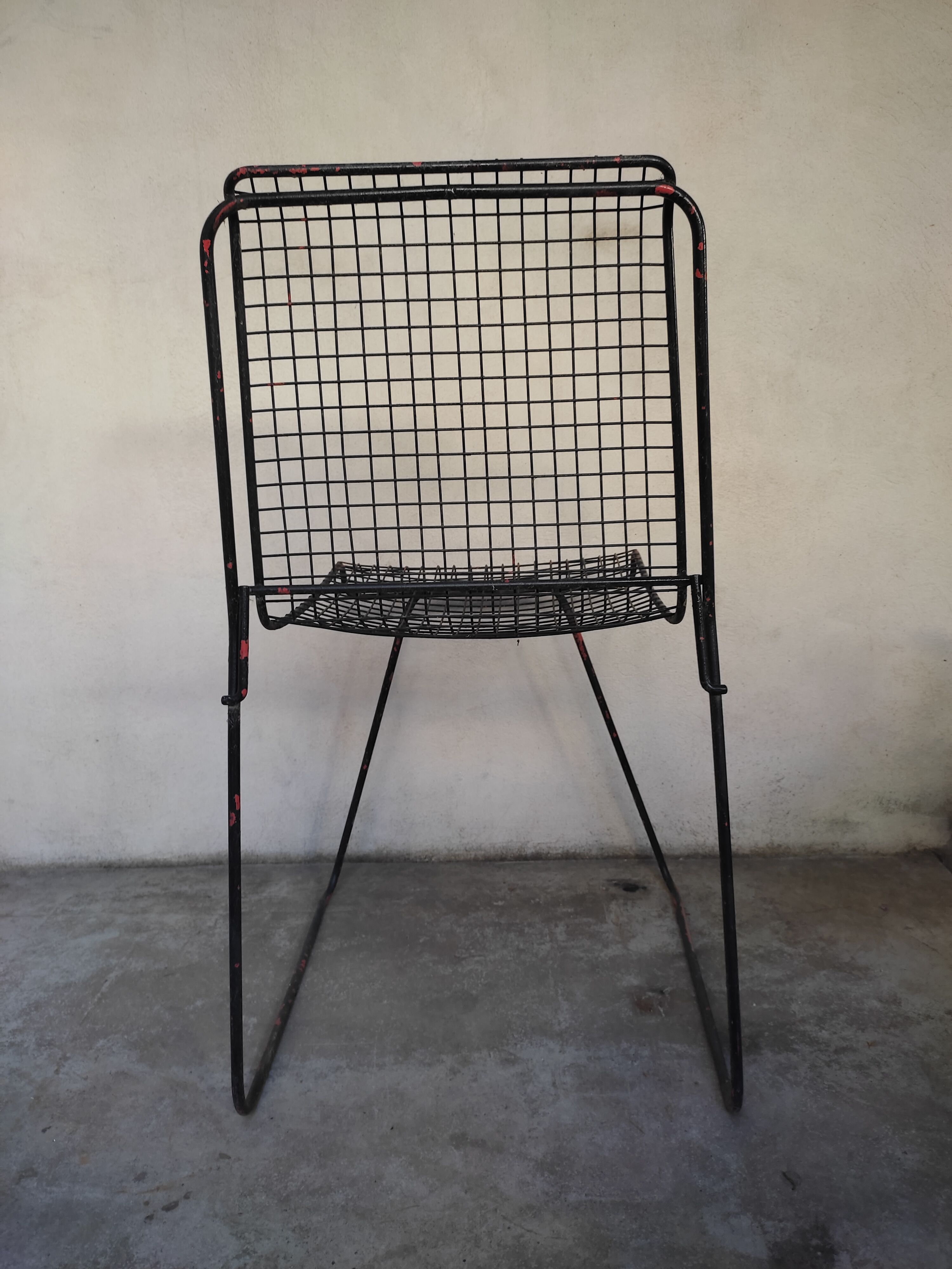 4 gridded metal chairs