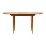 Scandinavian round teak table with hidden extension, 1970s