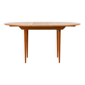 Scandinavian round teak table with hidden extension, 1970s