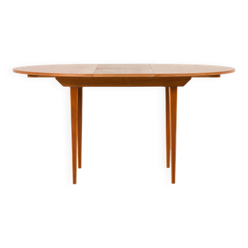 Scandinavian round teak table with hidden extension, 1970s