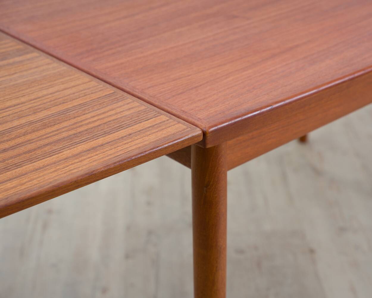 Teak dining table, made in Denmark, by the company Glos.