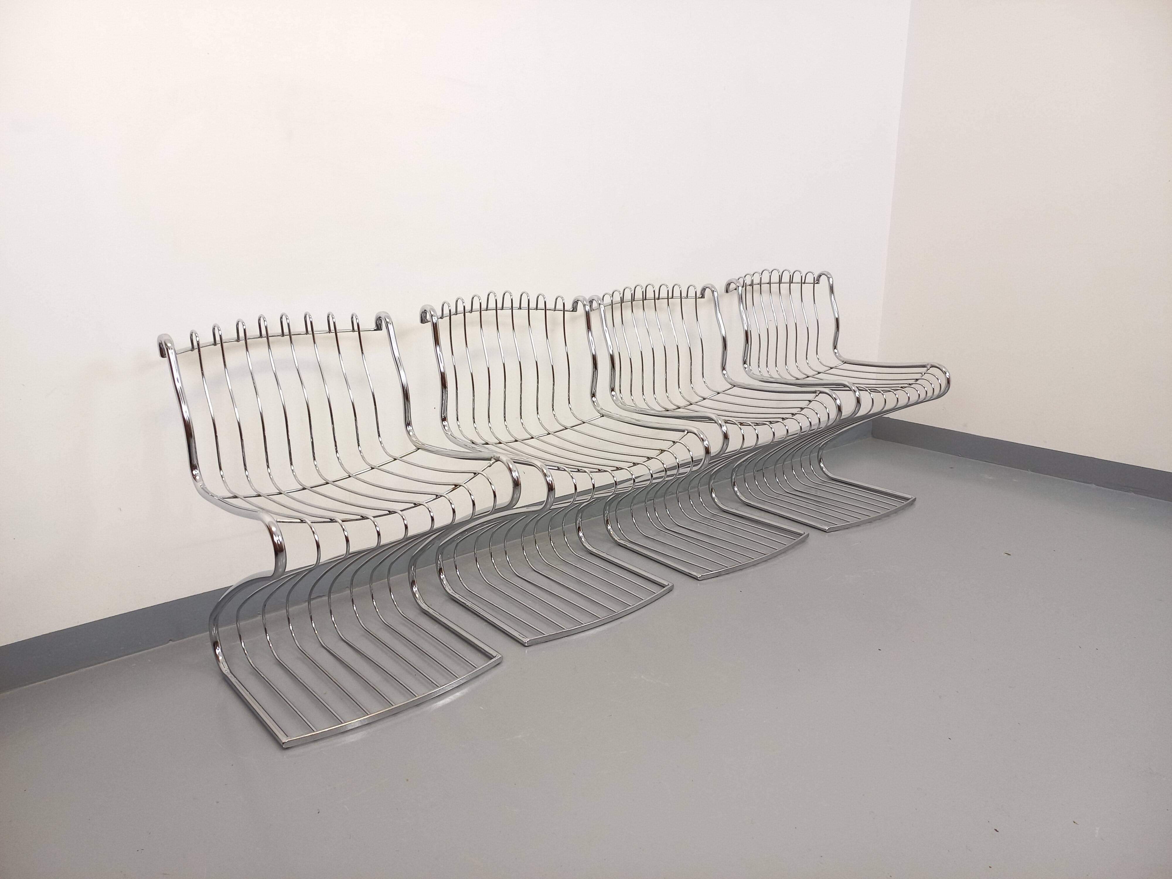 Set of 4 vintage Italian chairs by Gastone Rinaldi in chrome metal.